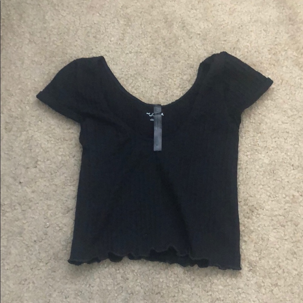 Frilly black top